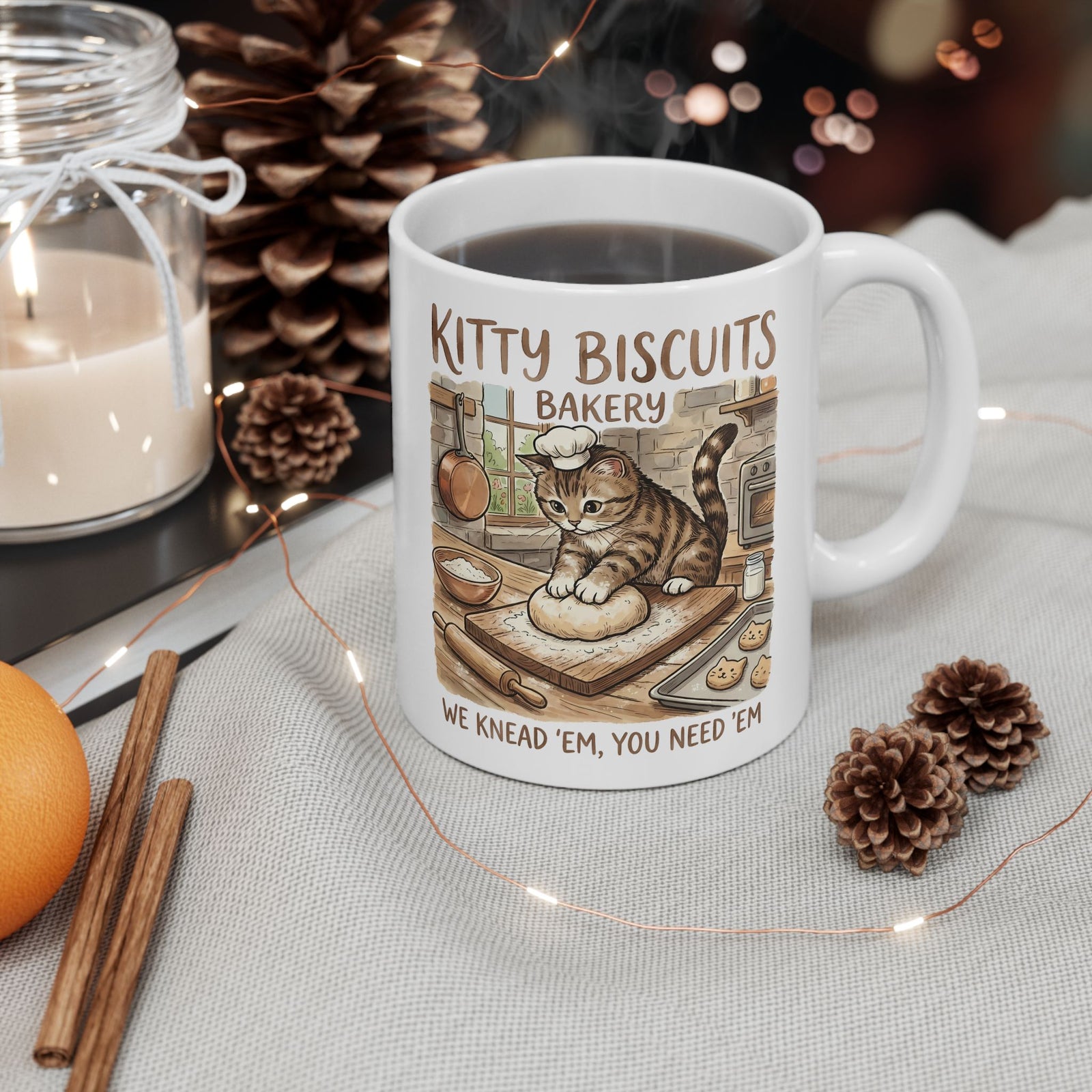 Kitty Biscuits Bakery Ceramic Mug — "We Knead 'Em We Need 'Em" Cat Bakery Mug