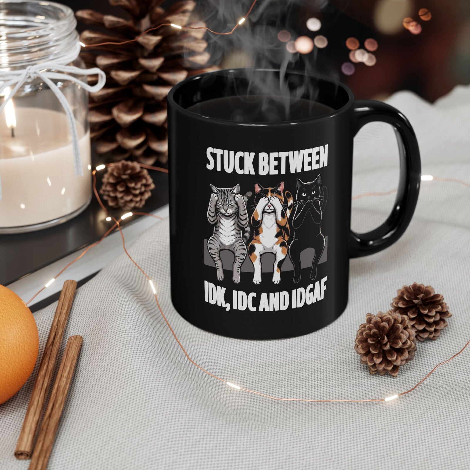 Stuck Between IDK IDC And IDGAF Black Mug — Funny Sarcastic Three Cats Mug