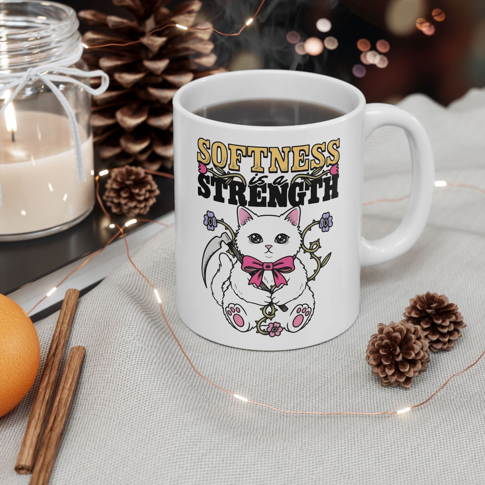 Softness Is A Strength Ceramic Mug — Funny Cute White Kitten Scythe Graphic Mug