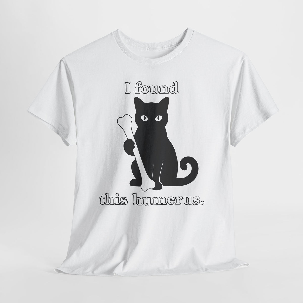 Cat Pun T-Shirt — "I Found This Humerus" Cute Black Cat Holding Bone Tee