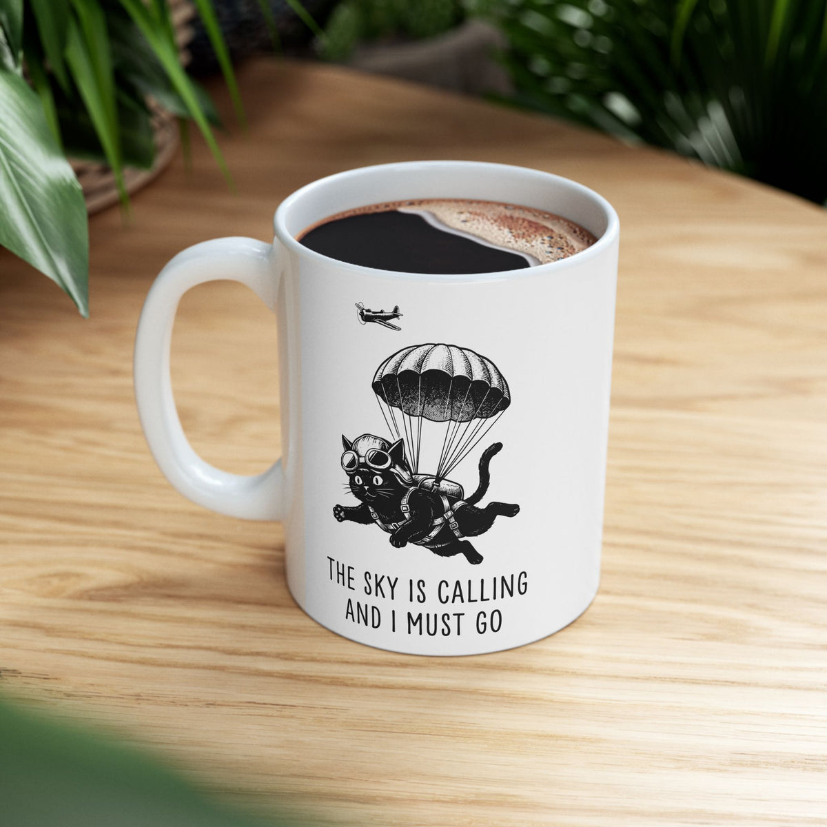 The Sky Is Calling And I Must Go Ceramic Mug — Funny Parachuting Black Cat Mug
