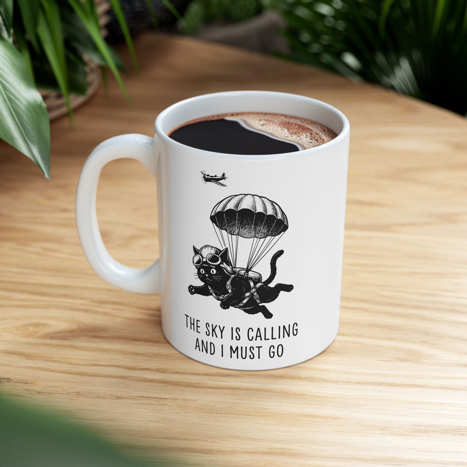 The Sky Is Calling And I Must Go Ceramic Mug — Funny Parachuting Black Cat Mug