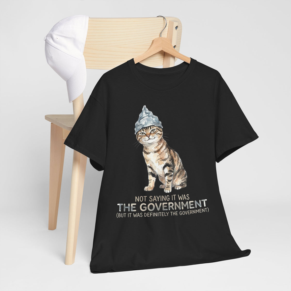 Conspiracy Cat T-Shirt — Funny Tin Foil Hat Cat Tee (“Not Saying It Was The Government”)