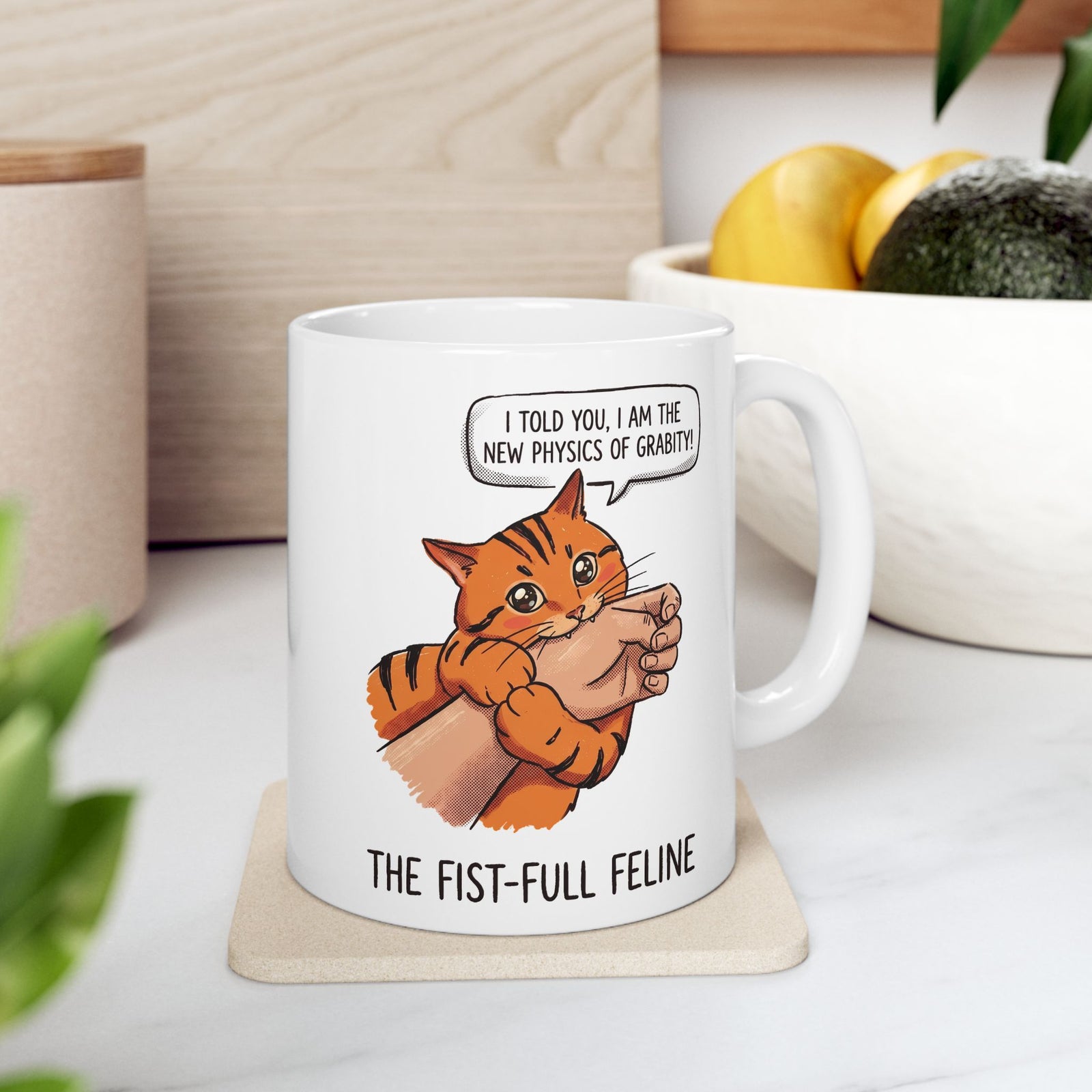 The New Physics Of Grabity Ceramic Mug — Funny Orange Cat Biting Hand Mug