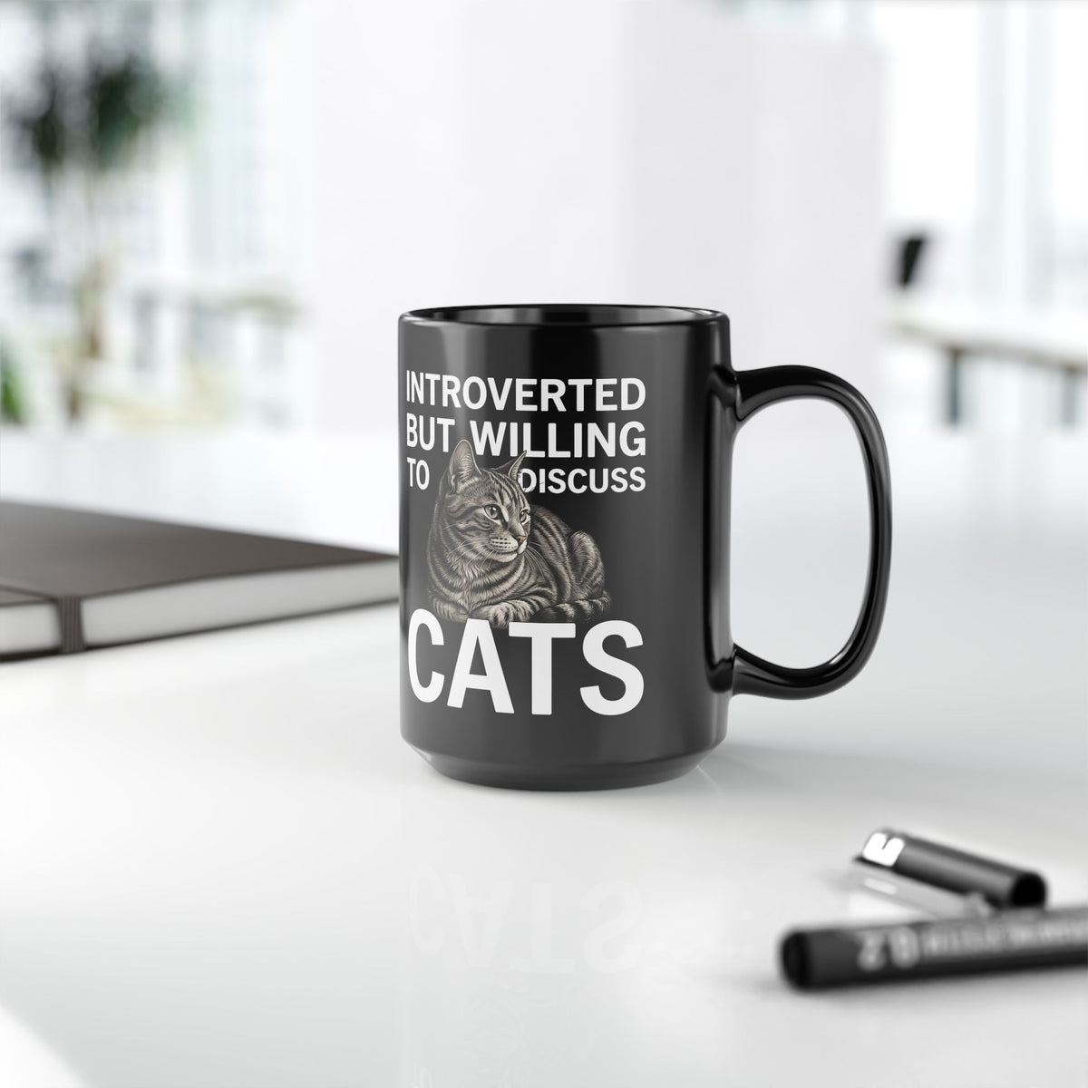 Introverted But Willing to Discuss Cats Black Mug